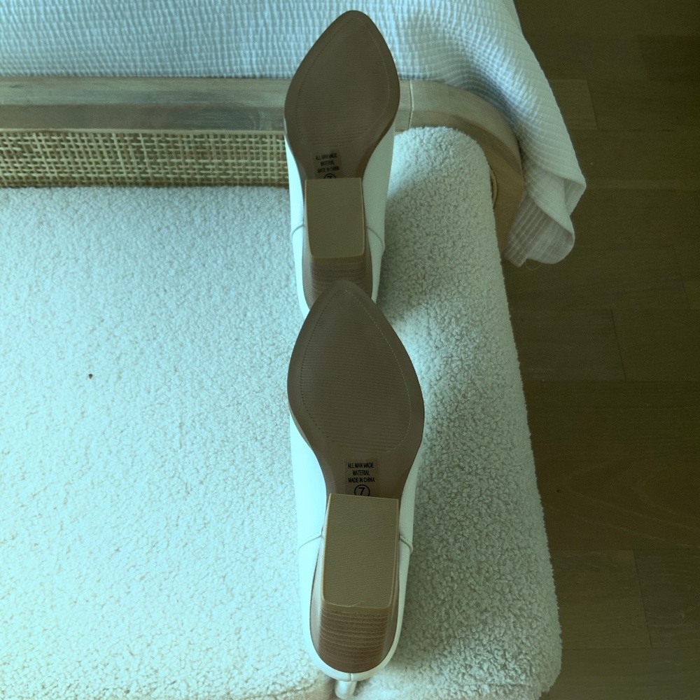 Ivory calf height cowboy boots with  urged tan block heel